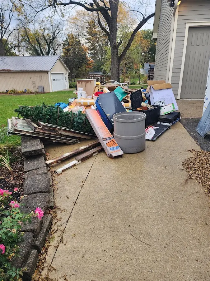 Dumpster being loaded with debris for 30 Yard Dumpster Rental in Clarion